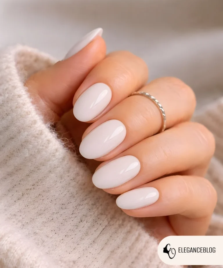 Milky white gel nails with glossy finish for winter nail inspiration