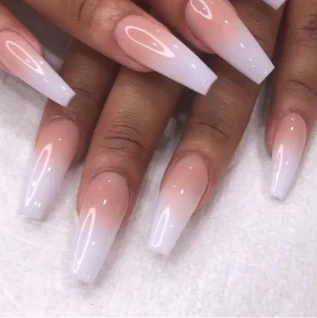 Colored acrylic nails during a nail fill after filing, showing a fresh color applied over a refill