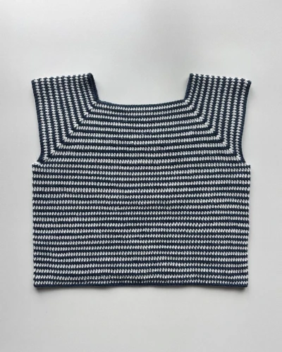 Front view of crochet striped raglan top showing color contrast and breathable texture.