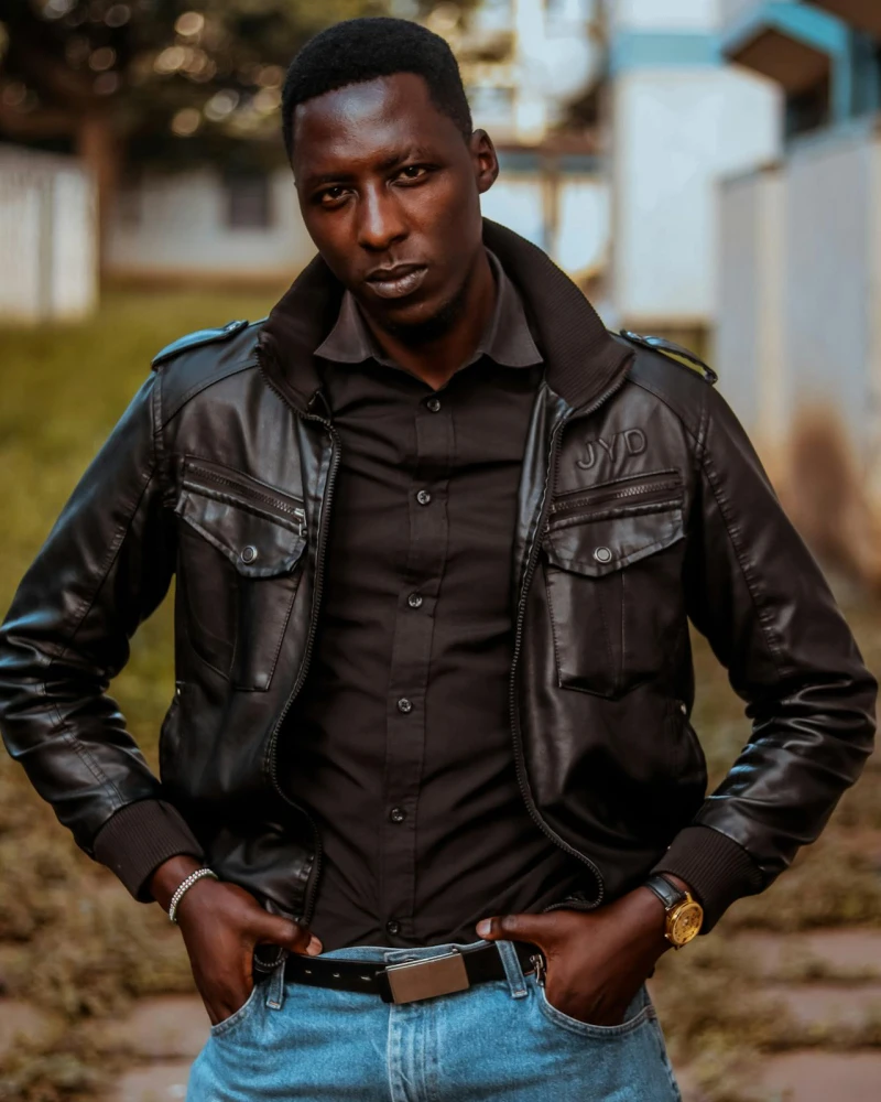 Casual street photo of a man in a black leather jacket