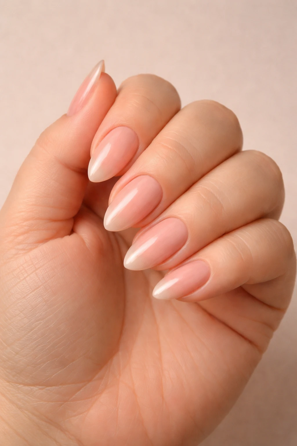 Close-up of almond nails on fat fingers