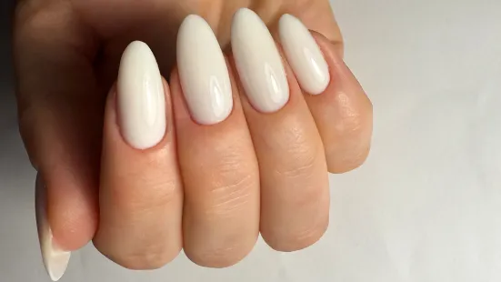 artist showing almond shaped nails