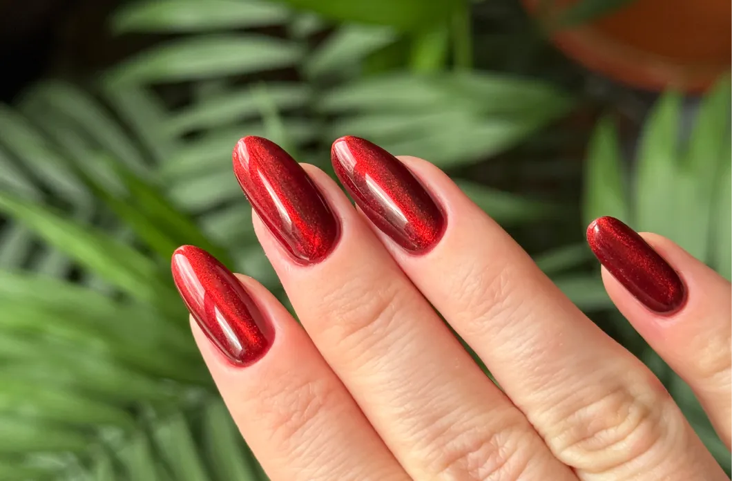 image of red glitter oval nails