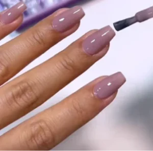 woman showing short coffin nail design with gloss finish